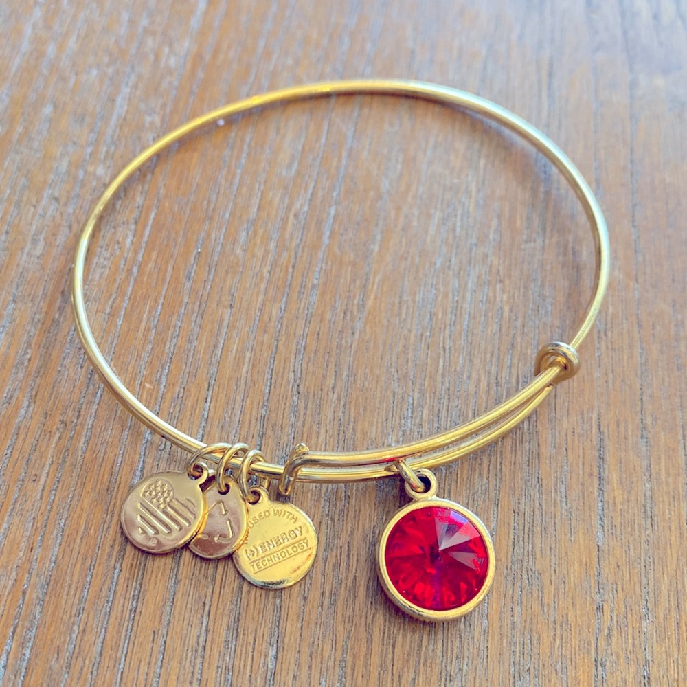 Never worn - July/red Alex & Ani gold